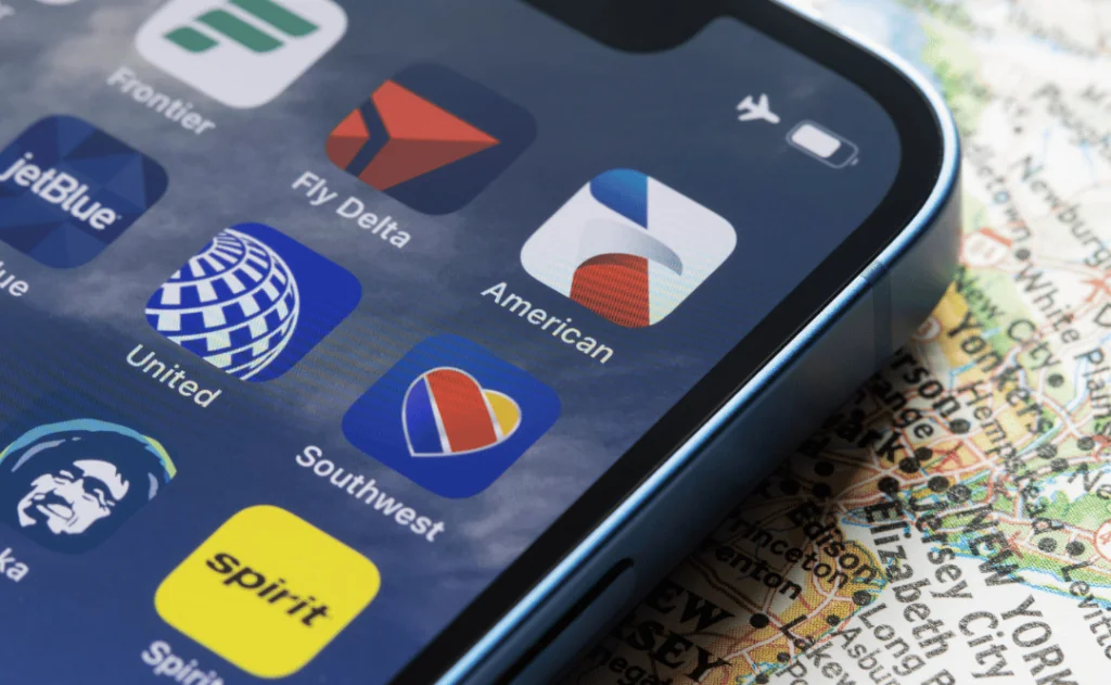 8 leading U.S. airlines app icons are seen on an iPhone. American Airlines, Southwest, Delta Air Lines, United, Spirit, Alaska, JetBlue Airways, and Frontier