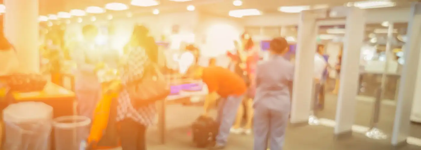 Blurry photo of airport security checkpoint