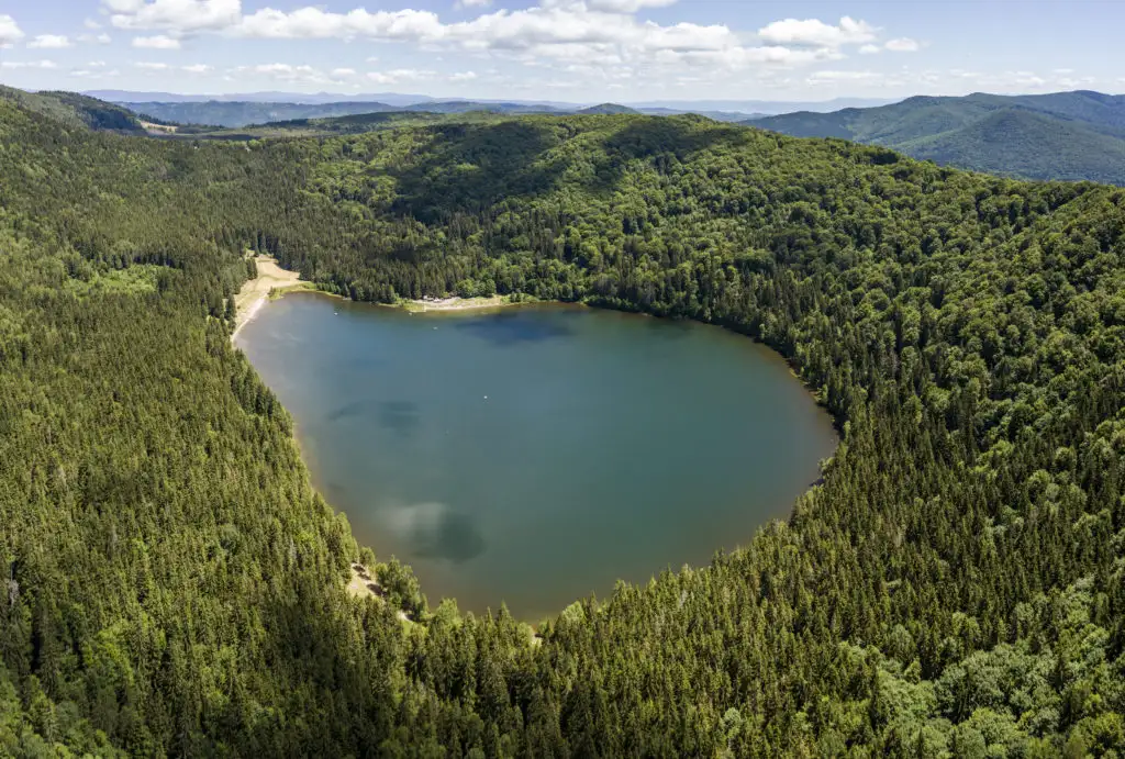 Saint Anne Lake in the crater of Ciomadul volcano in Romania