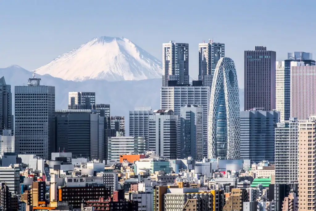 Mt. Fuji behind the skyline of the Shinjuku building in Tokyo, Japan