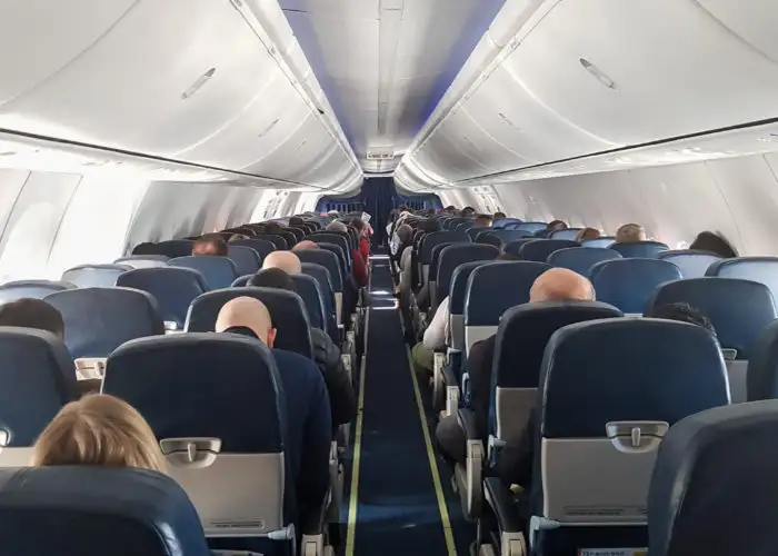 Interior of airplane with passengers