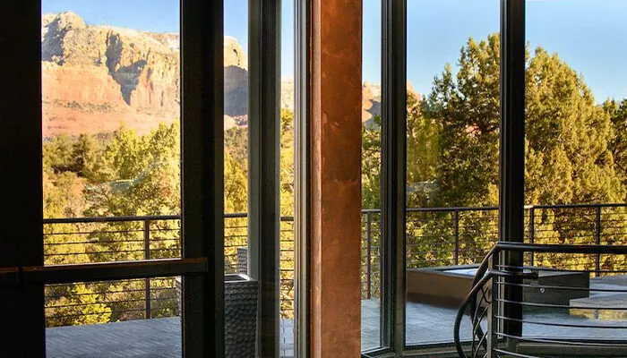 Glass-walled common area at Ambiente hotel in Sedona