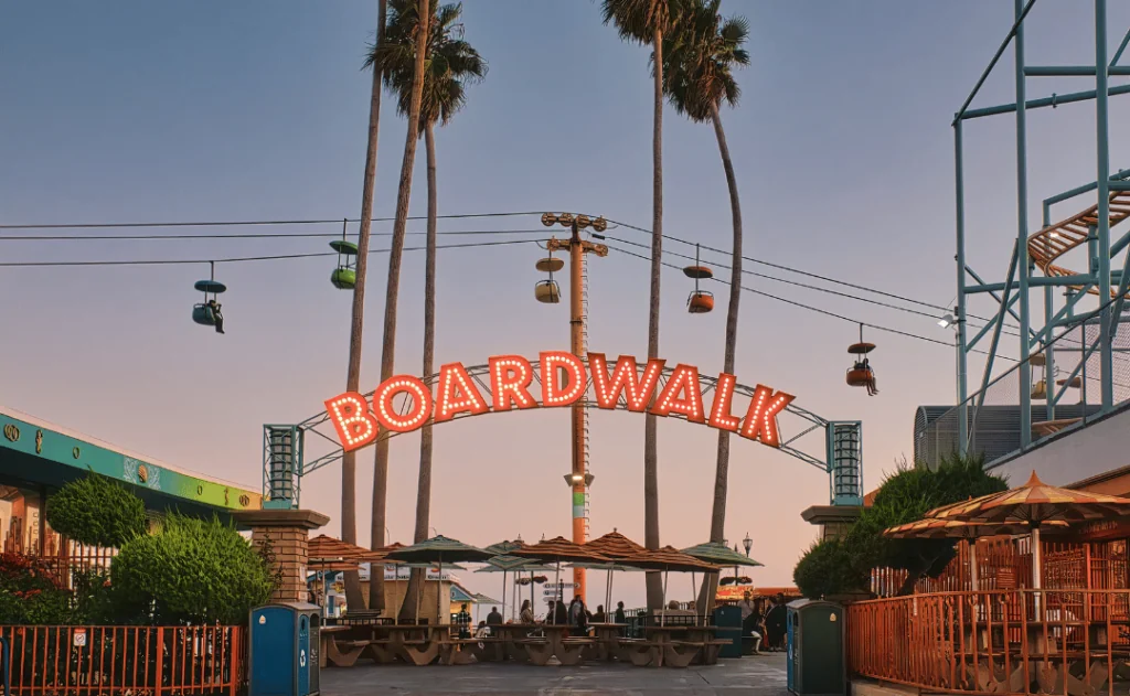 Beach boardwalk with an amusement park taken in Santa Cruz, CA