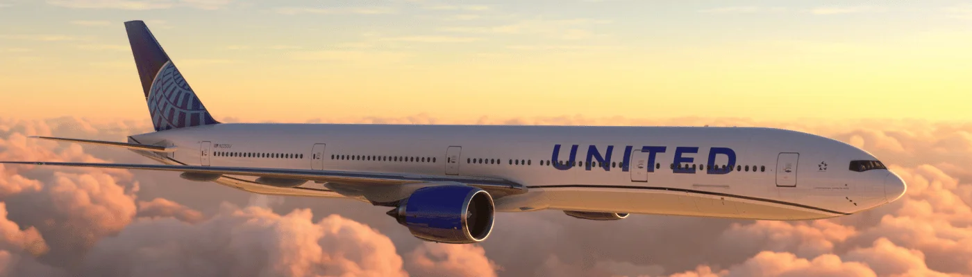 Boeing 777 United Airlines flying over amazing sunset