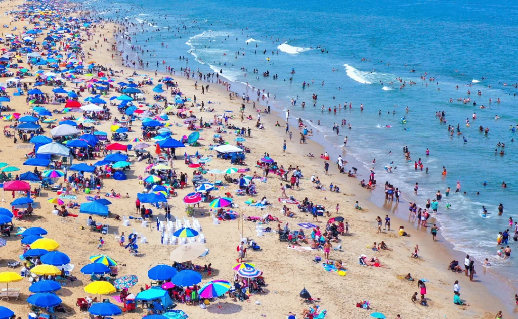 Aerial View of large crowd on the beach during 4th of July in Virginia Beach