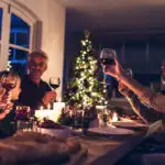 extended family toasting holiday dinner