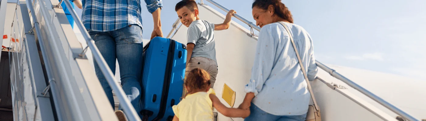 Header Image - Family boarding a plane, ready for vacation.