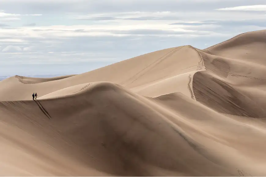 hikers on great sand dune national park.