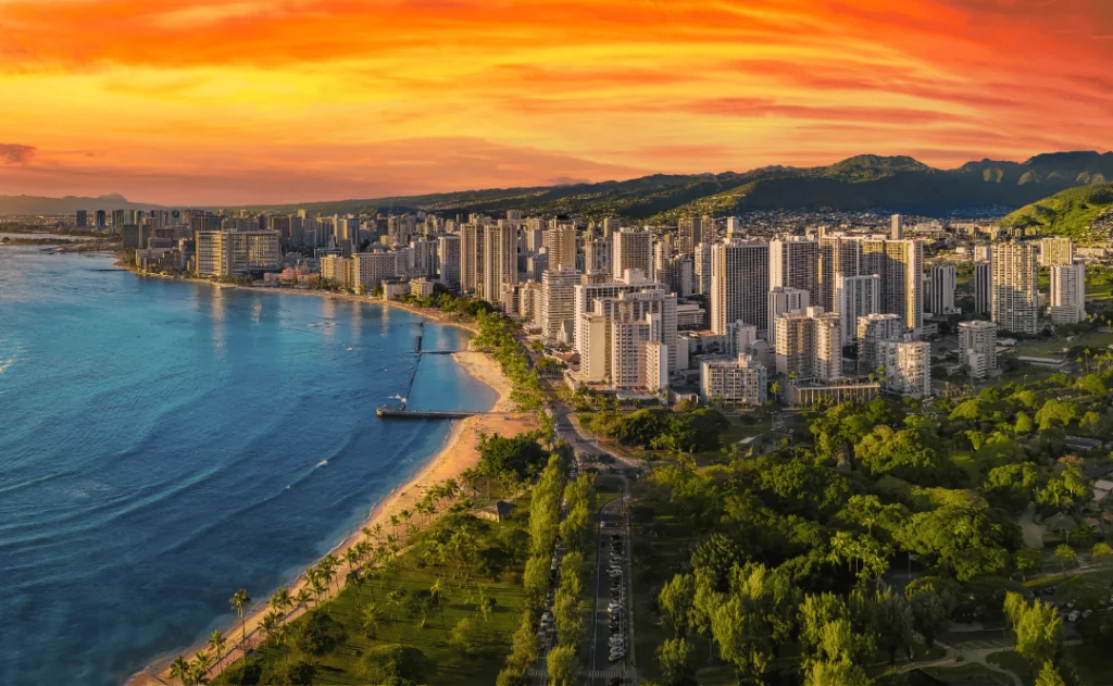 Honolulu with a vibrant red sunset 