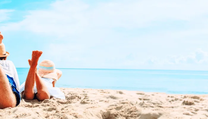 Father with son and daughter relax on beach vacation