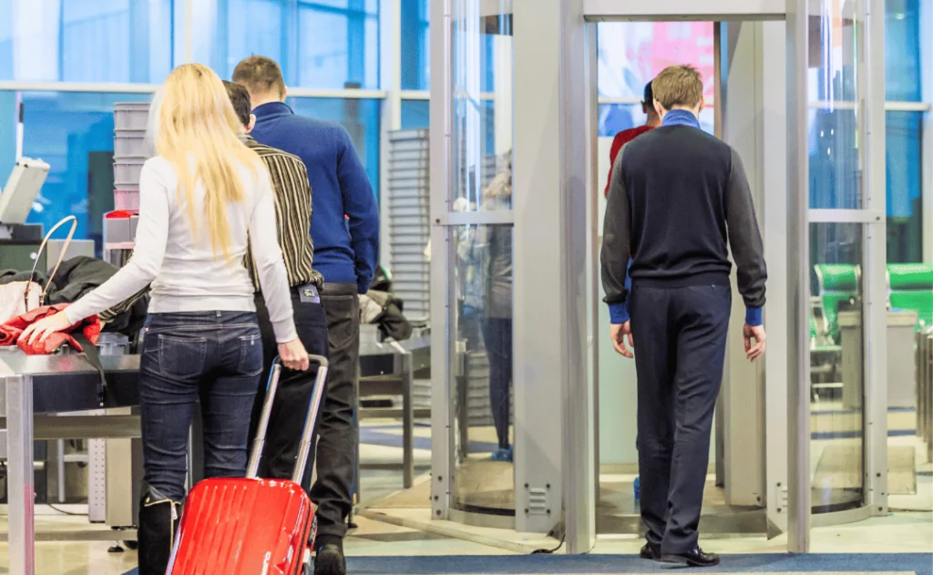 People going through airport security