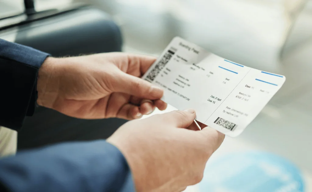 Plane ticket/Boarding Pass in male hands