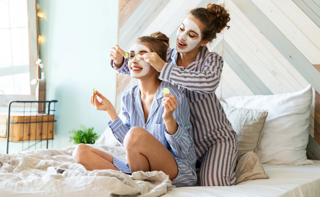 Girls having a spa day at home in pajamas. 