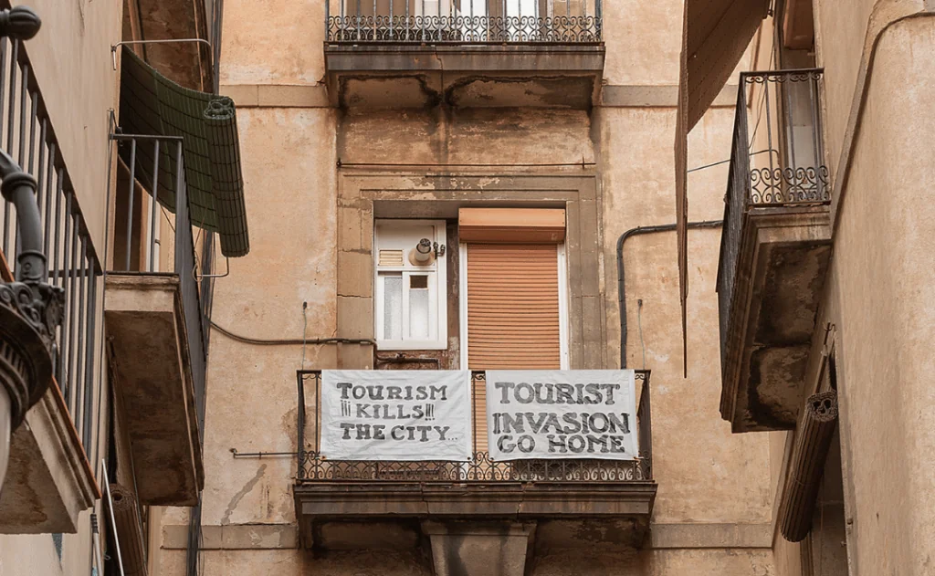 Protests banners against tourists and tourism Barcelona