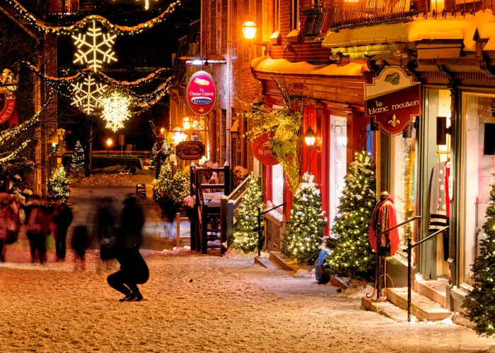 quebec city at night with holiday decorations.